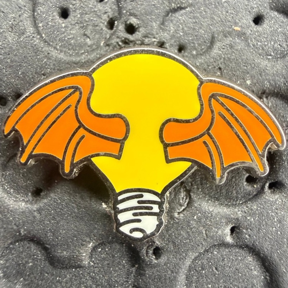 Disney parks Tiny Kingdom Second Edition Series 1 figment lightbulb trading pin
